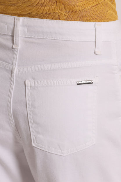 JEANS CROPPED CON RISVOLTO
