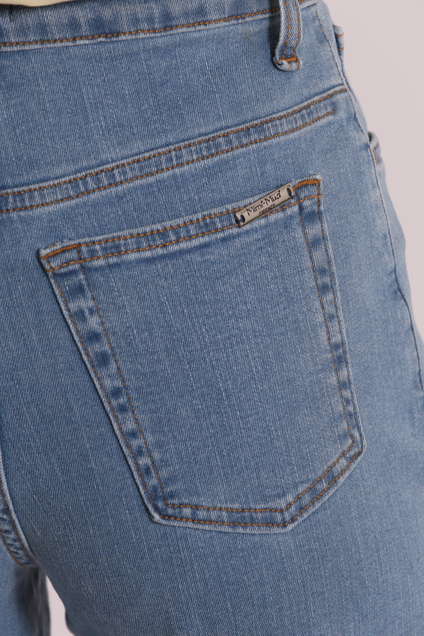 JEANS CROPPED CON RISVOLTO
