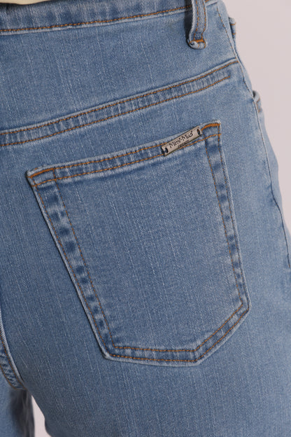 JEANS CROPPED CON RISVOLTO