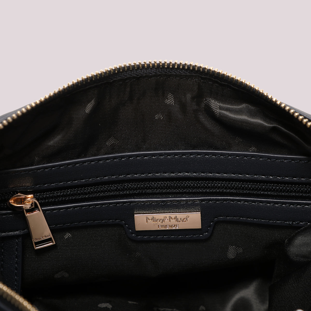 BORSA A BRACCIO MORBIDA TRAPUNTATA
