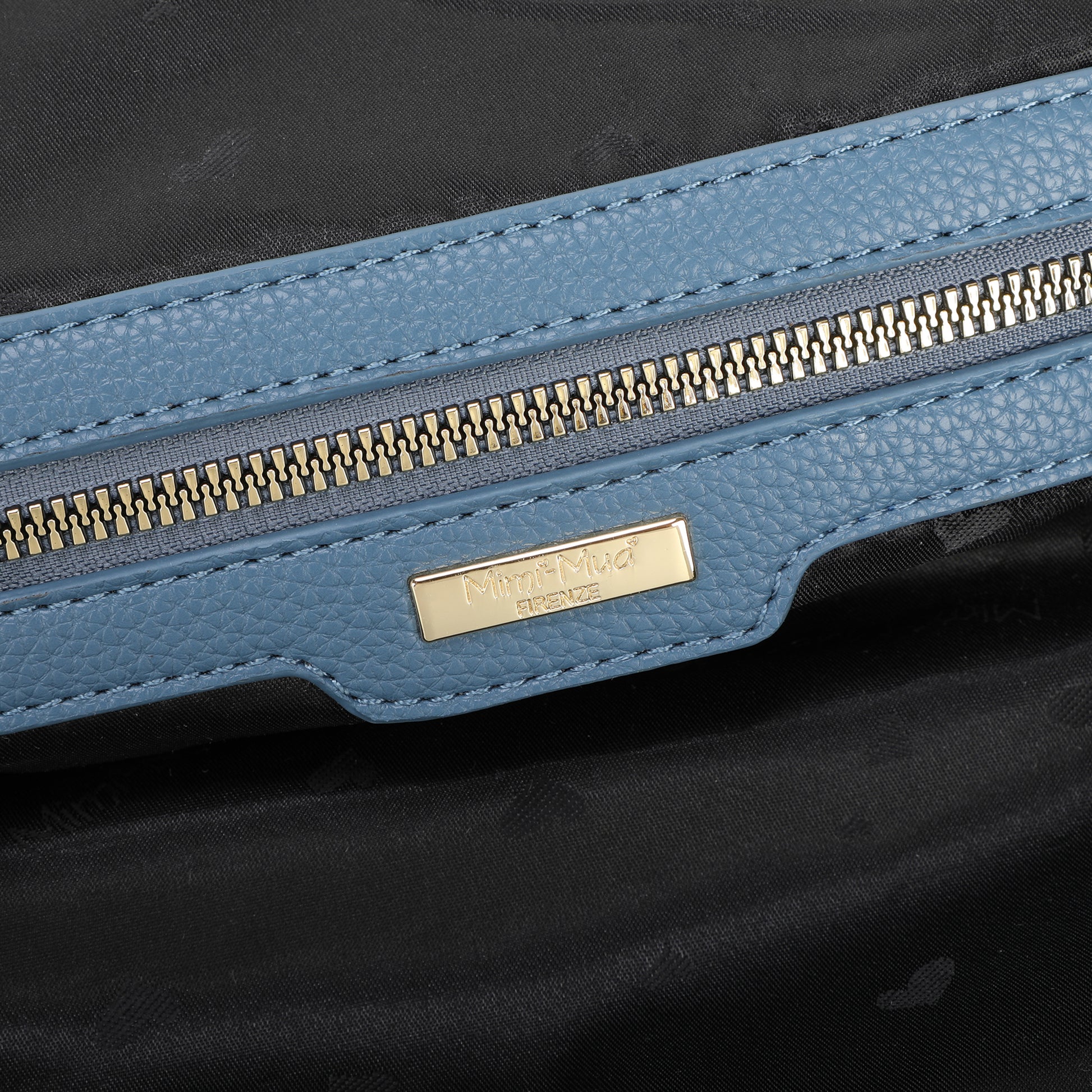 ZAINO CON CHIUSURA VERNICIATA IN TINTA