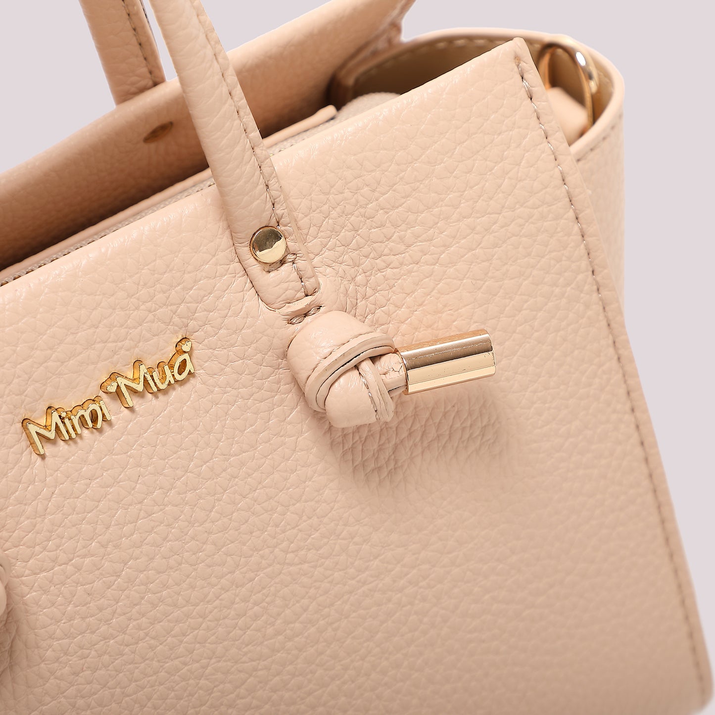 BORSA A MANO PICCOLA CON NODO AI MANICI