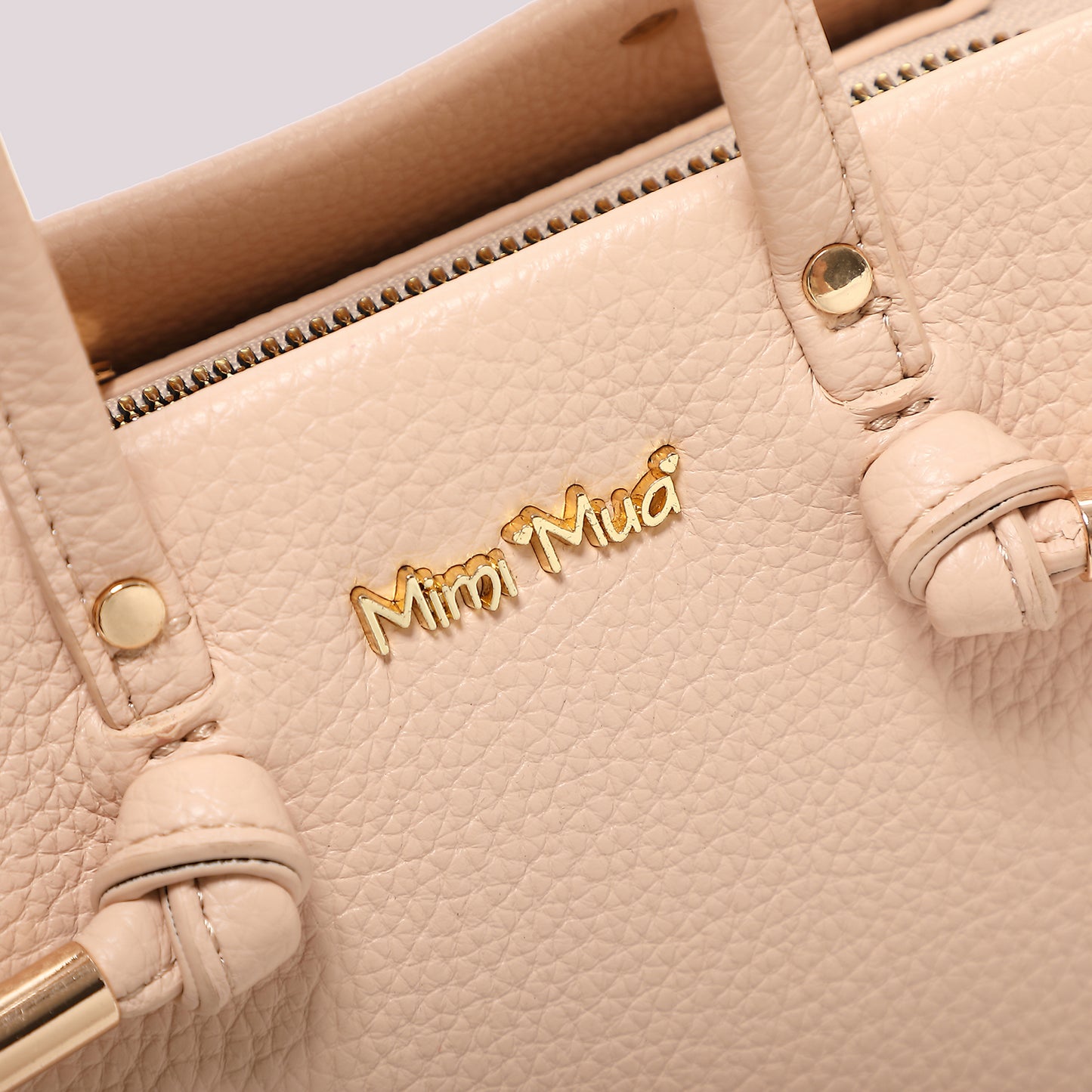 BORSA A MANO PICCOLA CON NODO AI MANICI