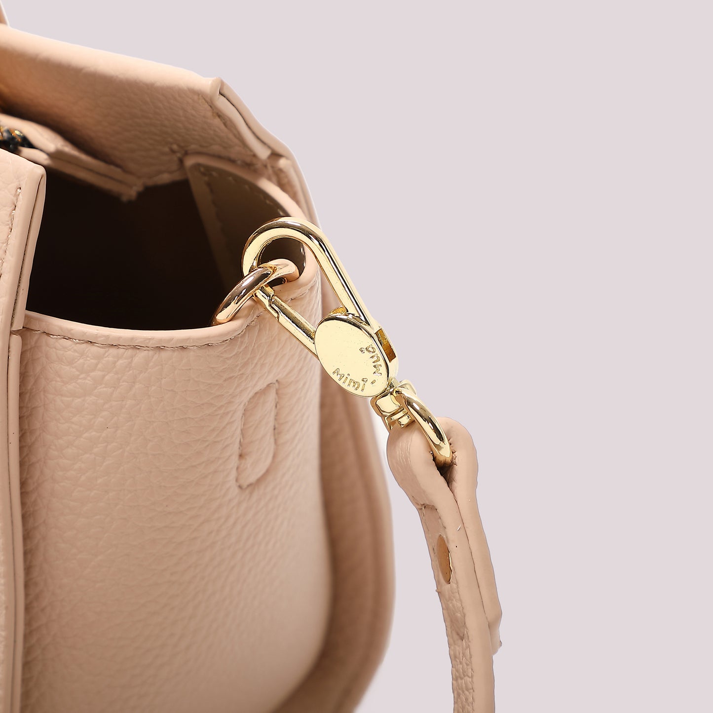 BORSA A MANO PICCOLA CON NODO AI MANICI