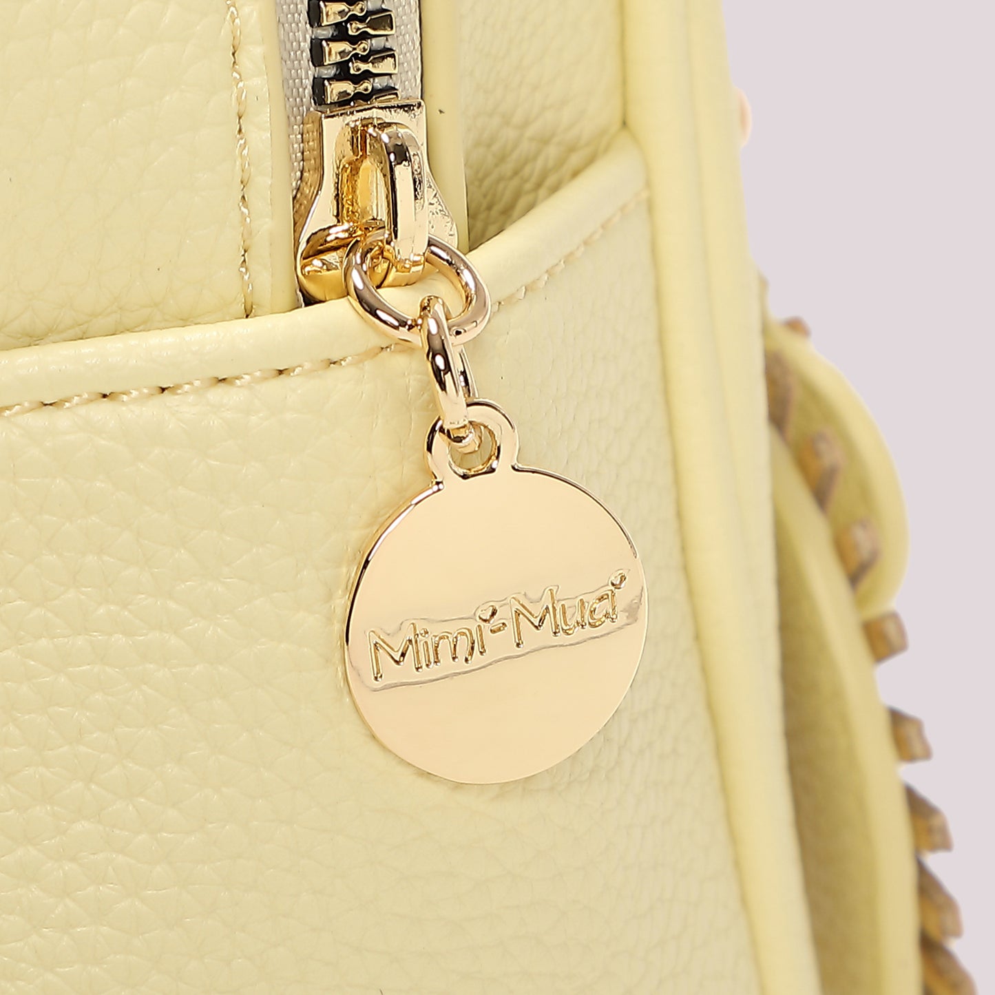 ZAINO PICCOLO CON CHARM A FIORE