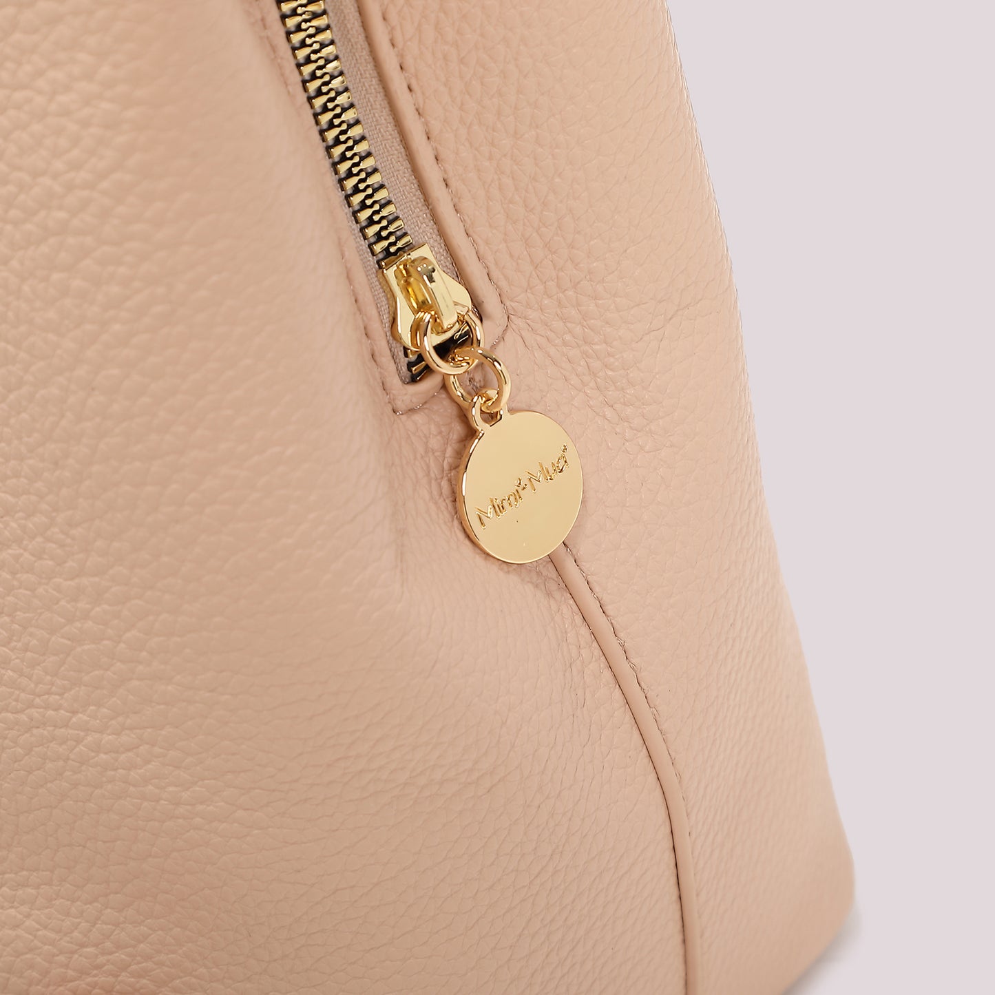 ZAINO CON BORDO INTRECCIATO