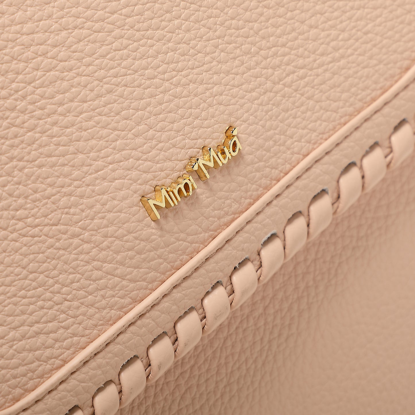 ZAINO CON BORDO INTRECCIATO