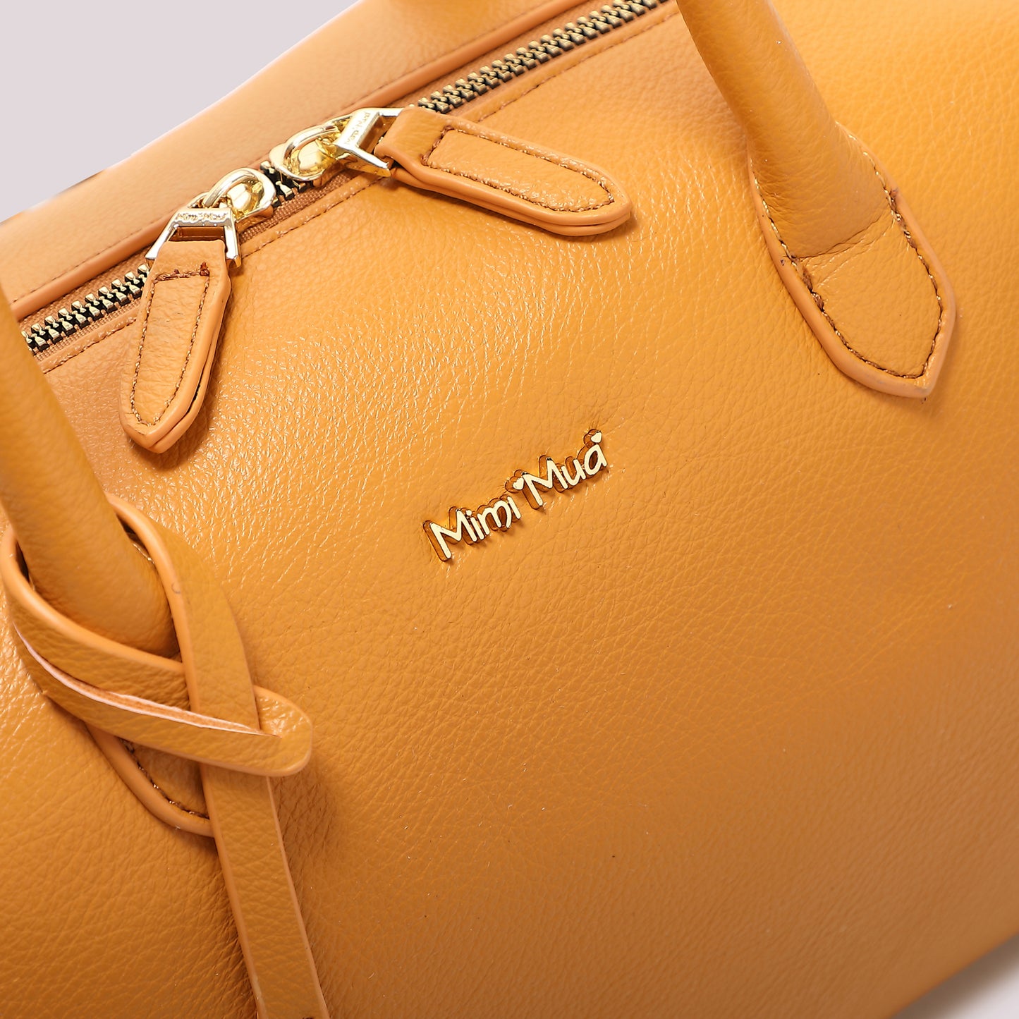 BORSA A BAULETTO MEDIA CON TARGHETTA LOGATA