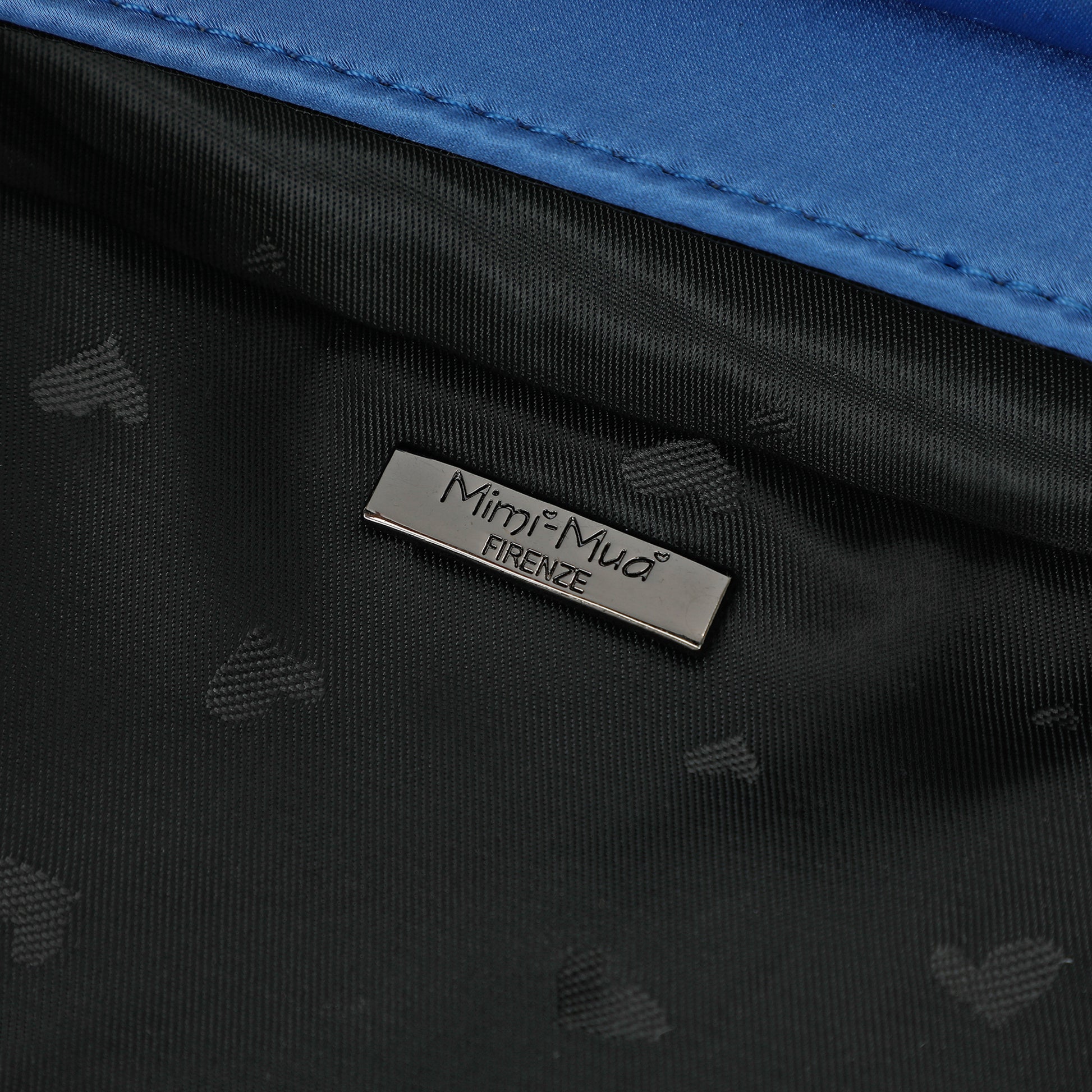 BORSA CON FIOCCO DI STRASS ASIMMETRICO