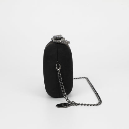 BORSA CLUTCH EFFETTO CAMOSCIO CON CHIUSURA A FIOCCO