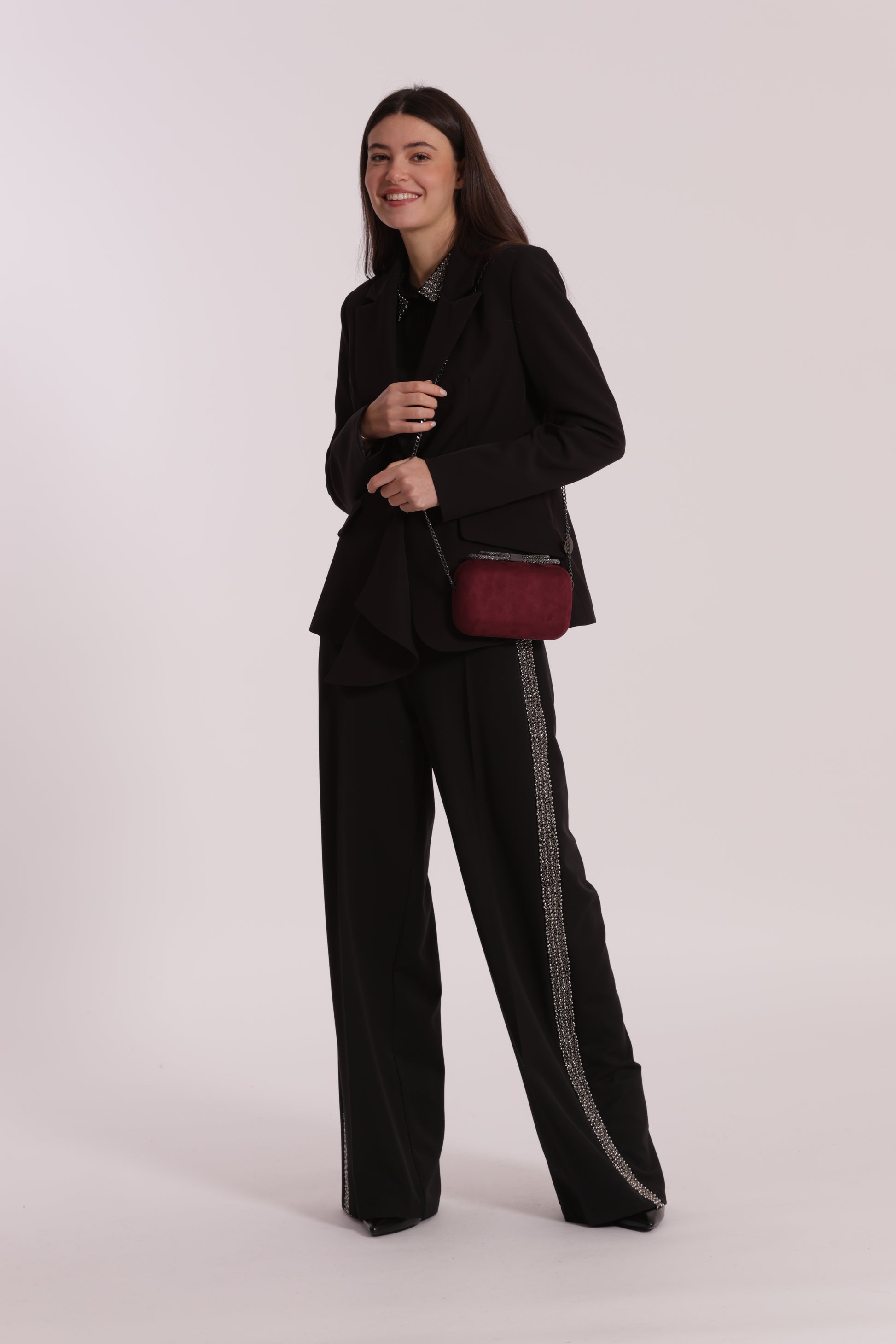 BORSA CLUTCH EFFETTO CAMOSCIO CON CHIUSURA A FIOCCO