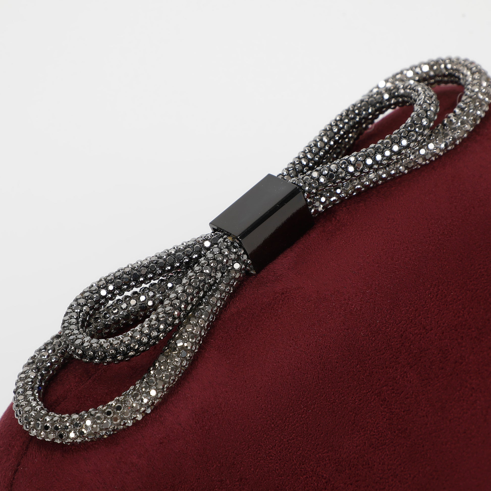 BORSA CLUTCH EFFETTO CAMOSCIO CON CHIUSURA A FIOCCO