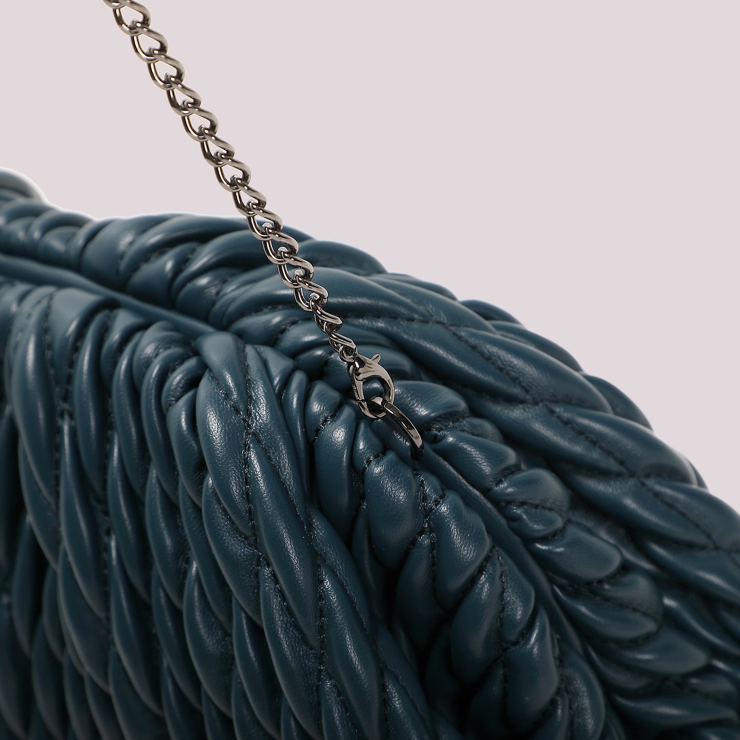 BORSA CLUTCH MORBIDA TRAPUNTATA