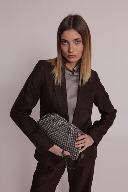 BORSA CLUTCH MORBIDA TRAPUNTATA