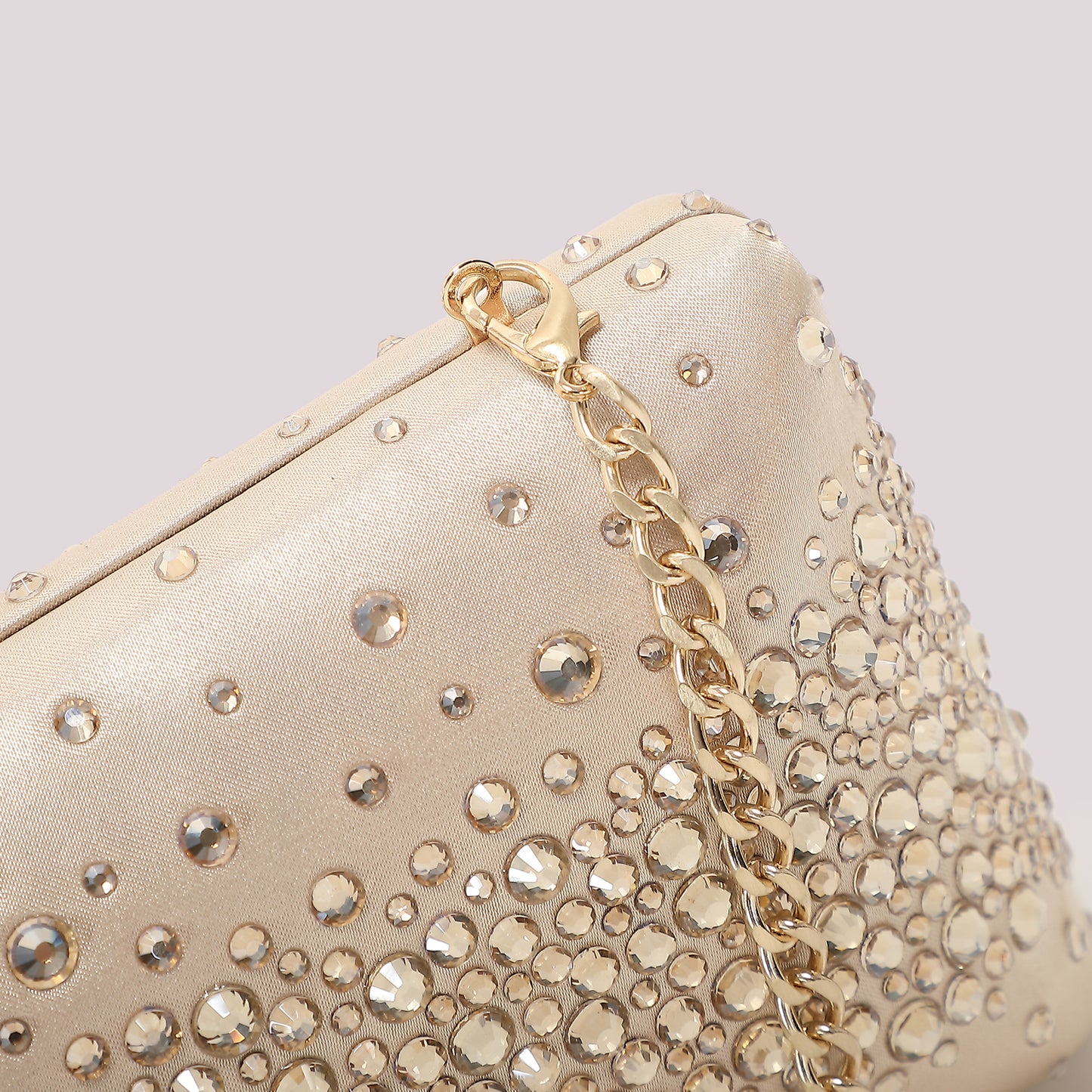 BORSA CLUTCH CON STRASS SPARSI
