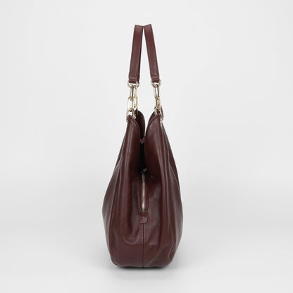 BORSA HOBO CON DETTAGLIO OCCHIELLI