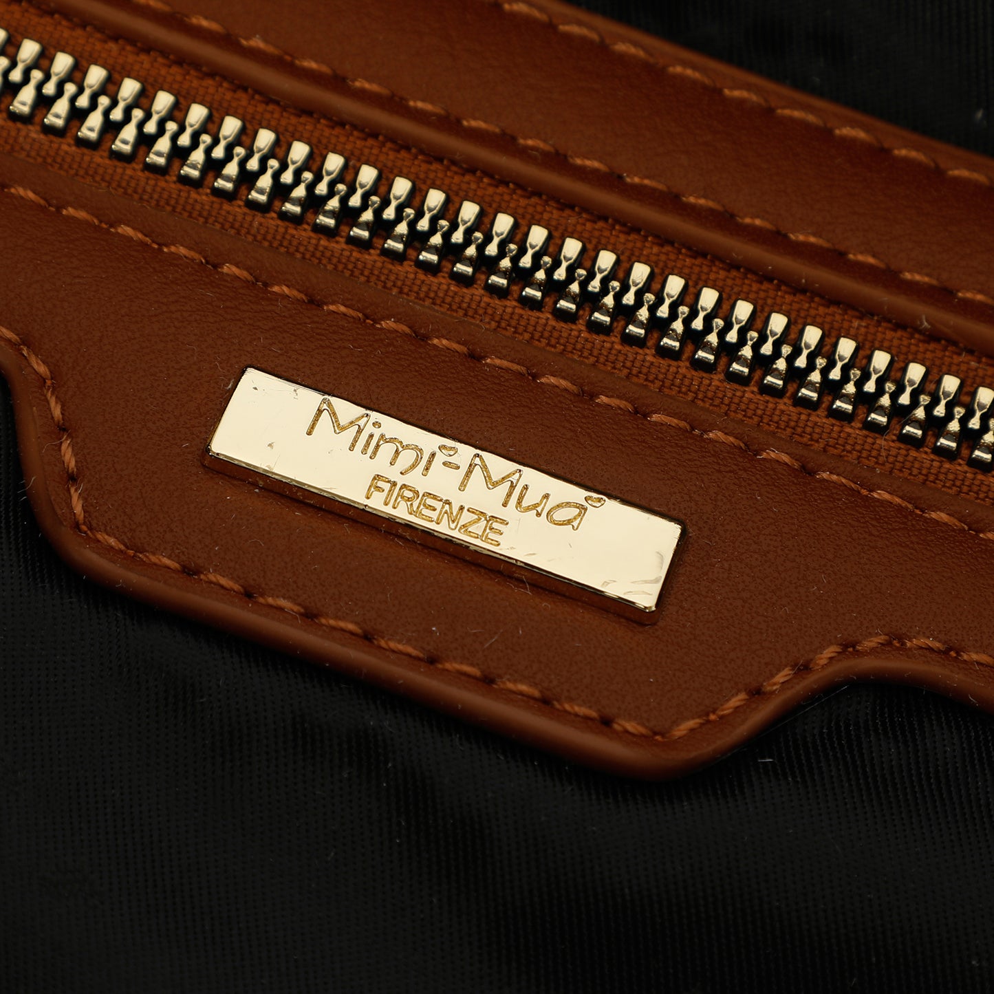 BORSA HOBO CON DETTAGLIO OCCHIELLI