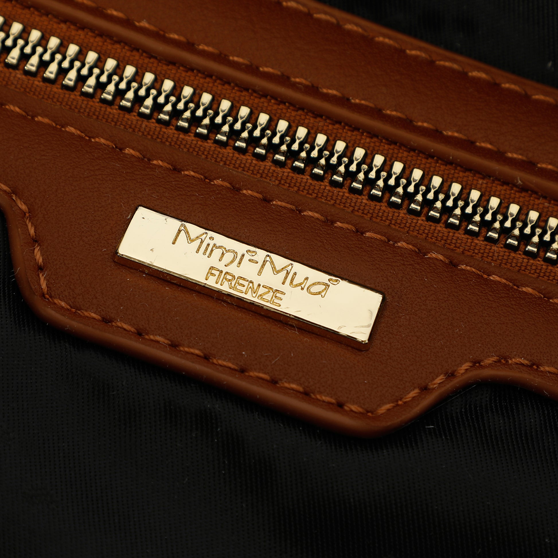 BORSA HOBO CON DETTAGLIO OCCHIELLI