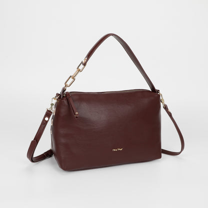 BORSA A SPALLA CON DETTAGLIO OCCHIELLI