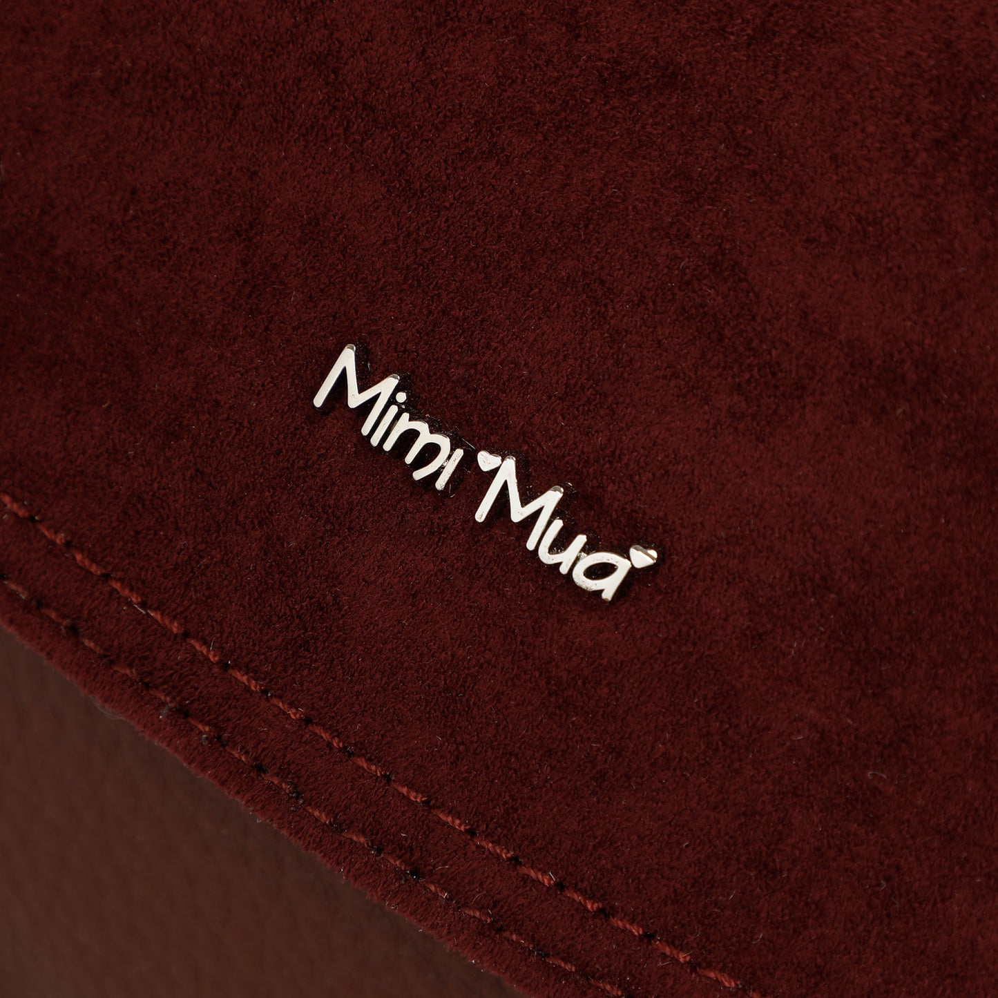 BORSA A MANO CON DETTAGLIO IN ECO SUEDE