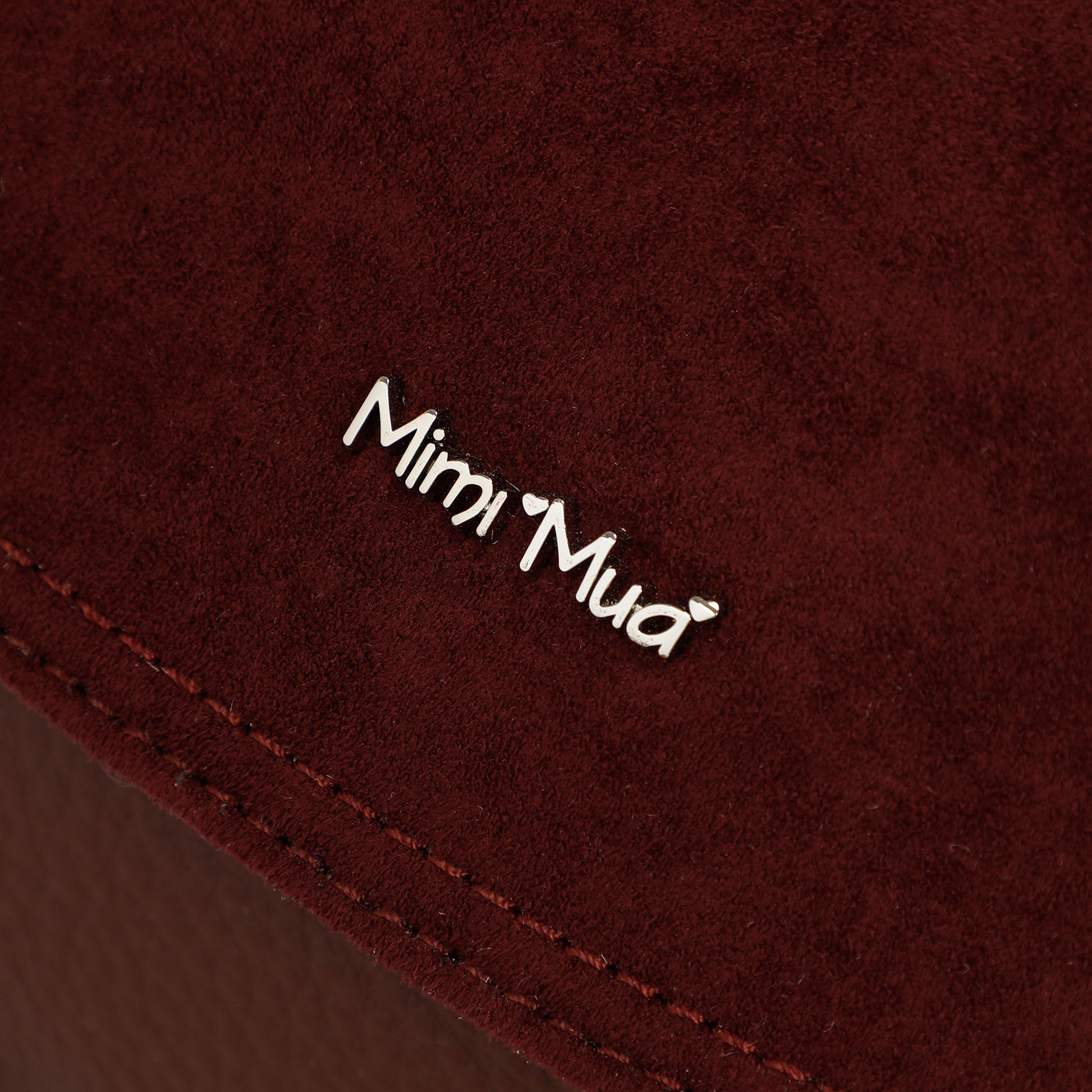 BORSA A MANO CON DETTAGLIO IN ECO SUEDE