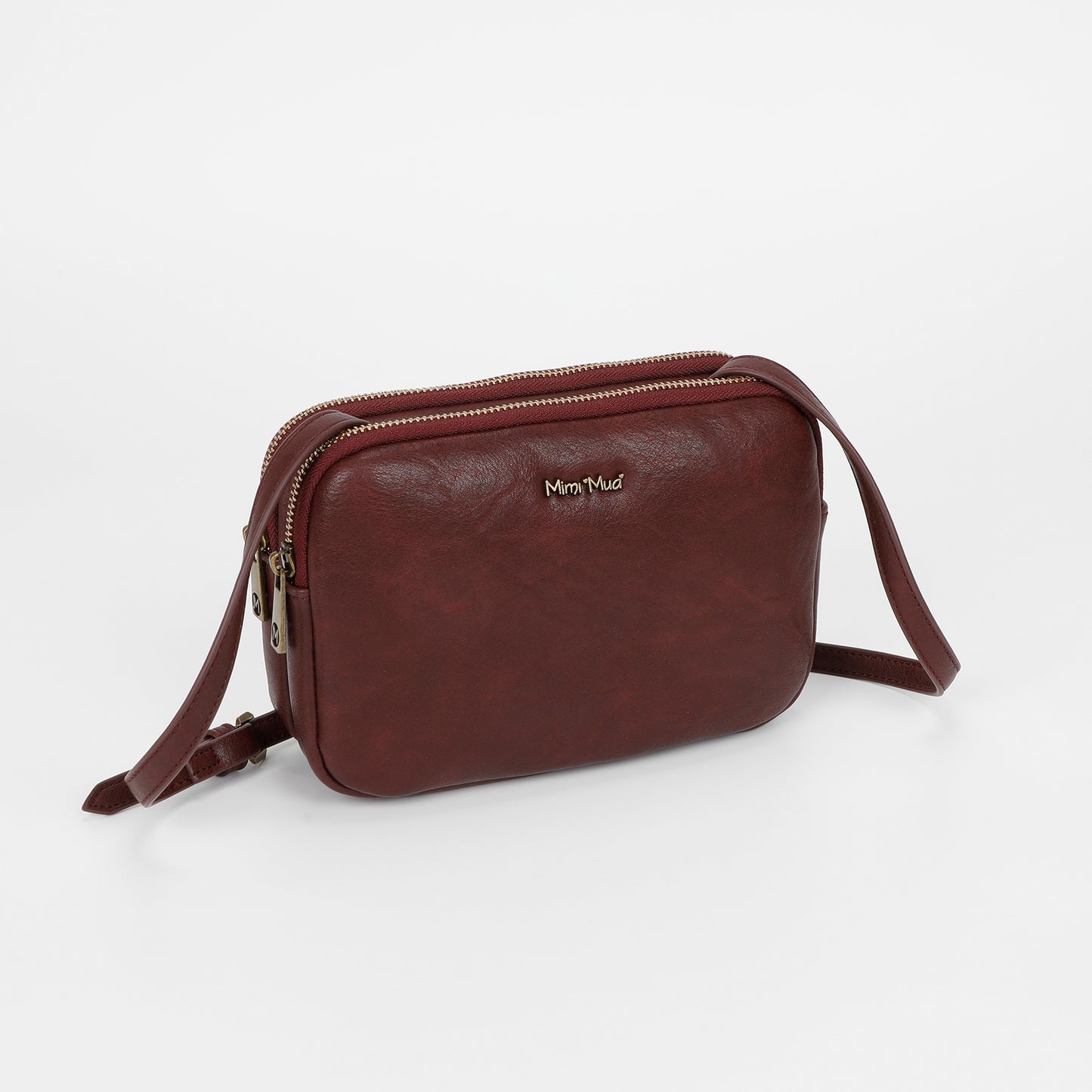 BORSA A TRACOLLA CON ACCESSORI IN OTTONE