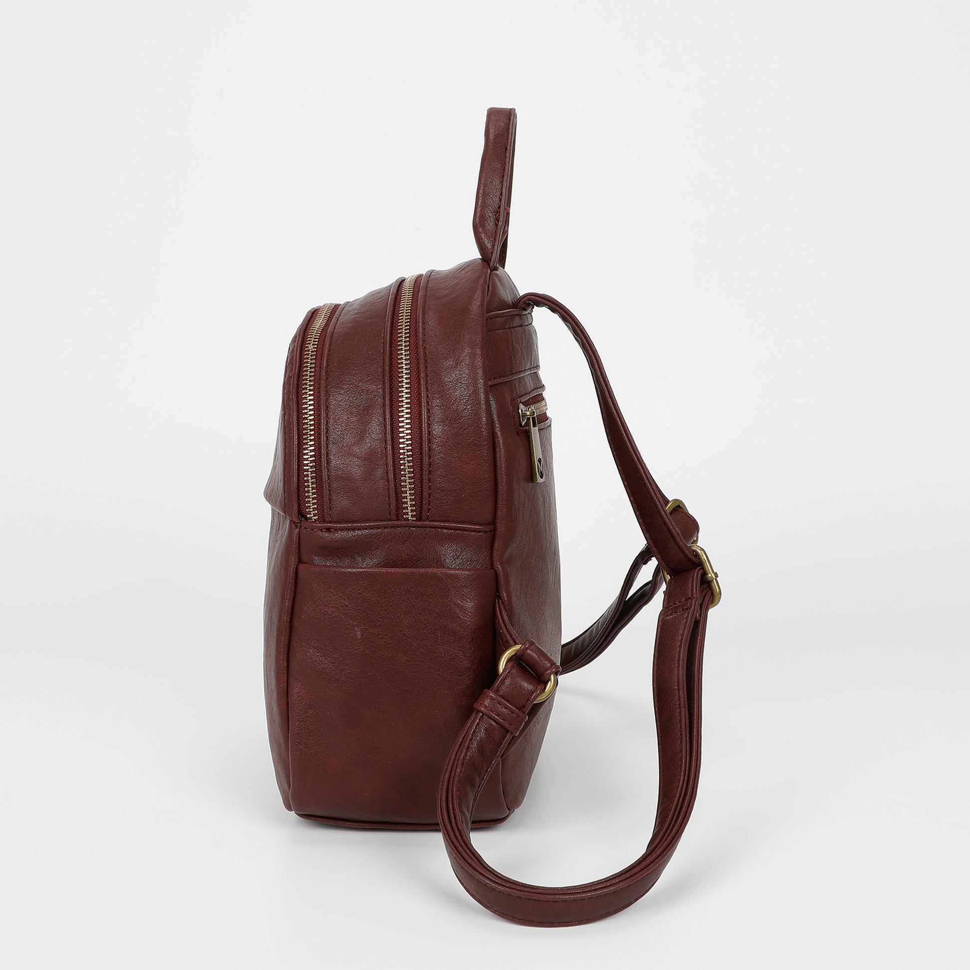 ZAINO CON ACCESSORI IN OTTONE