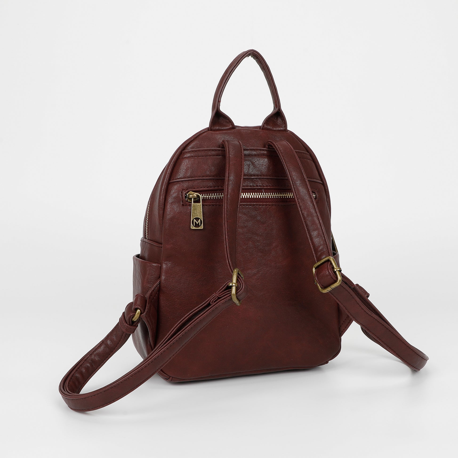 ZAINO CON ACCESSORI IN OTTONE