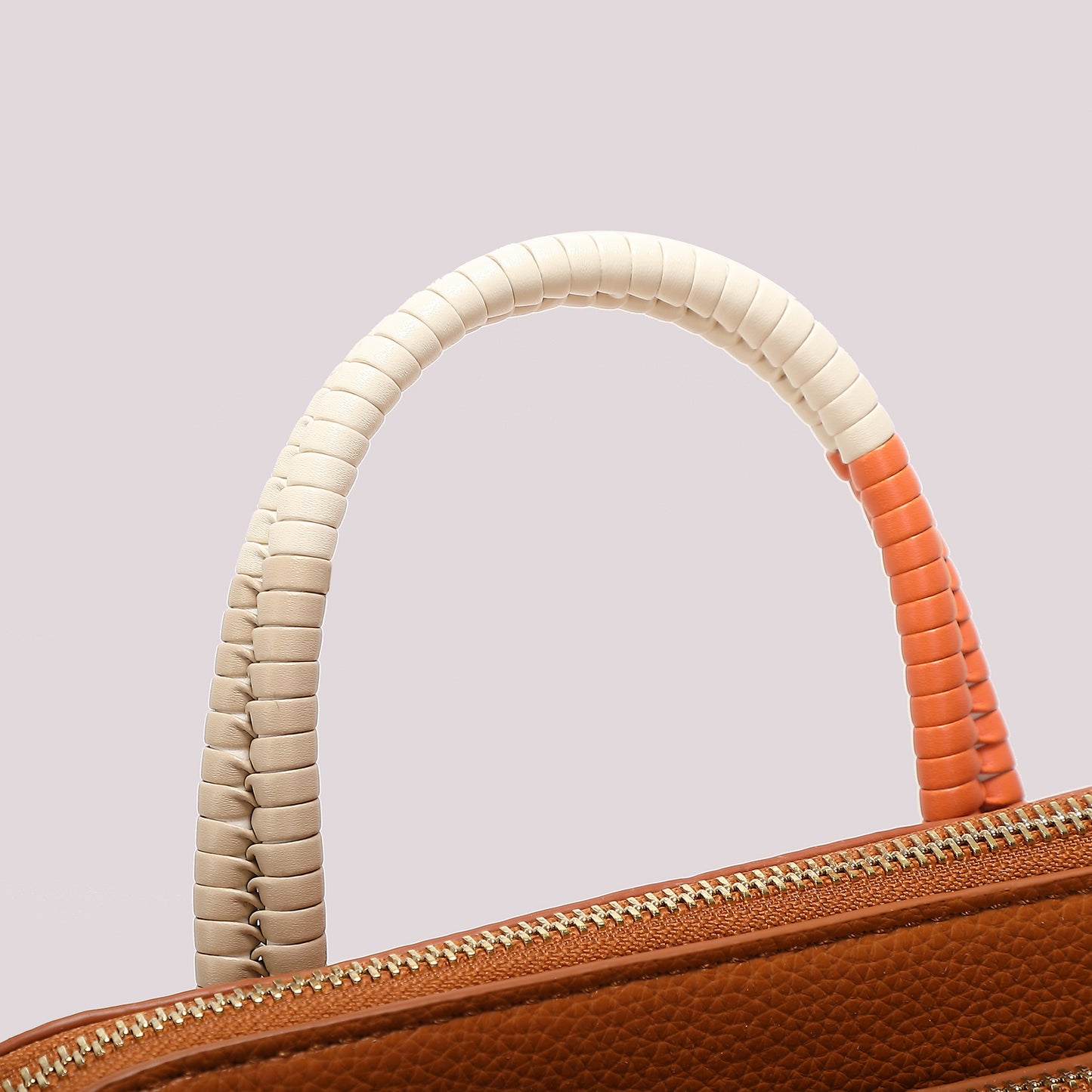 ZAINO CON MANICO INTRECCIATO