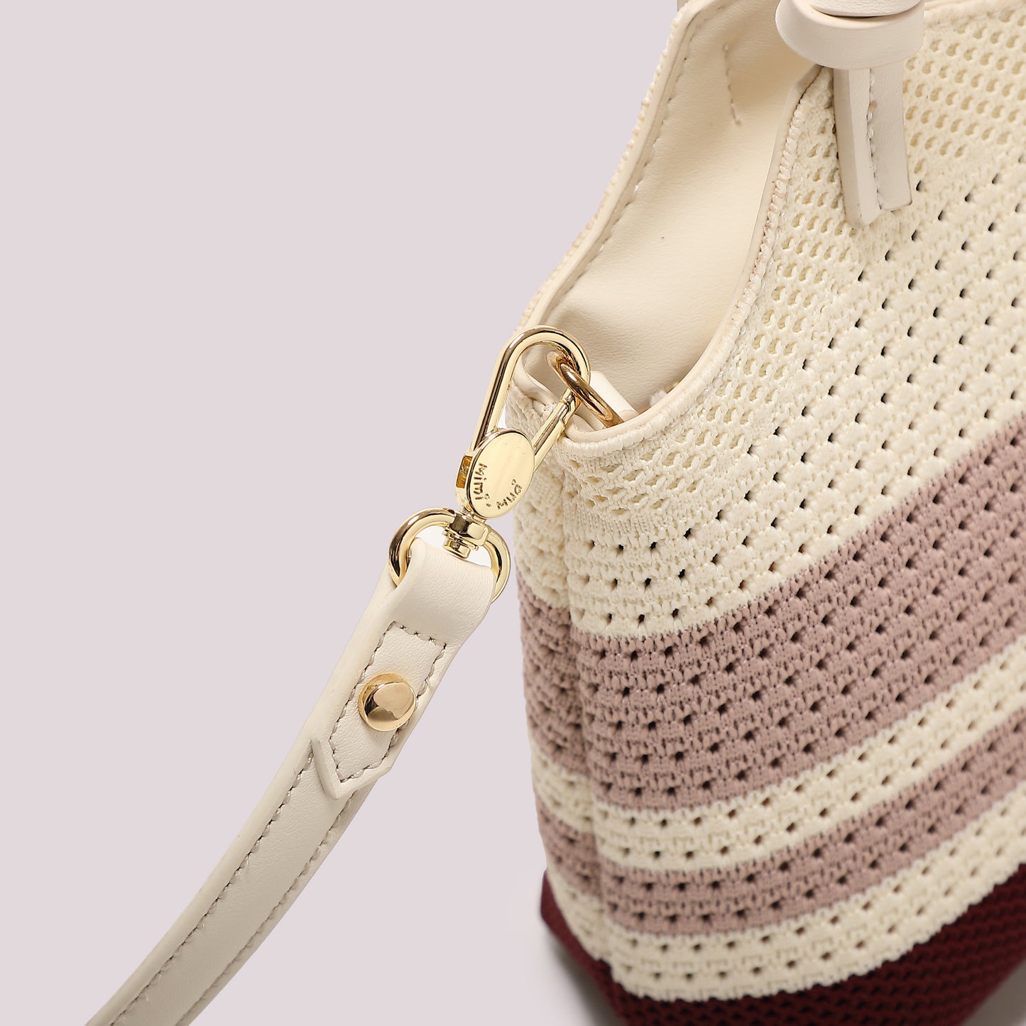 BORSA A MANO IN MAGLIA A RIGHE