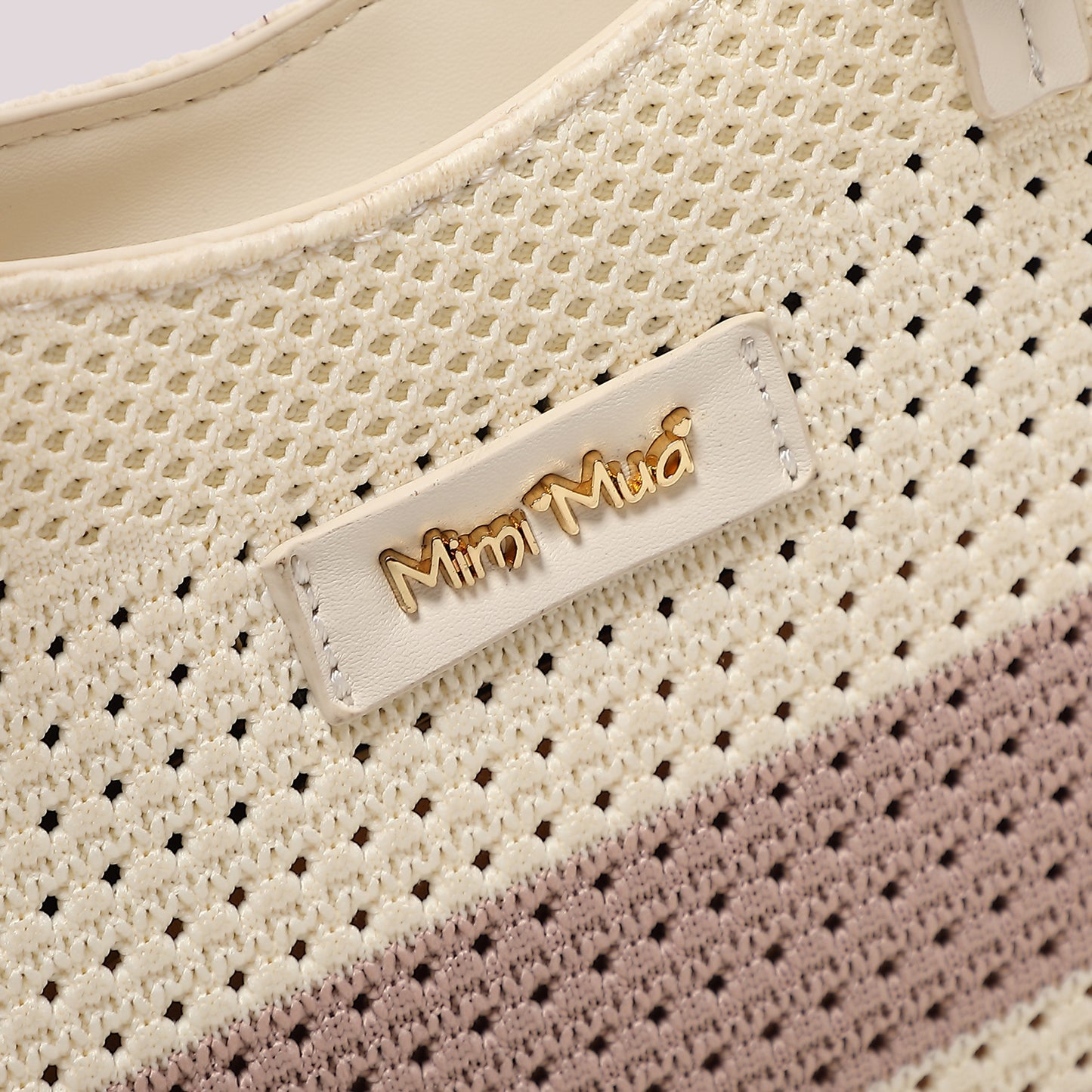 BORSA A MANO IN MAGLIA A RIGHE