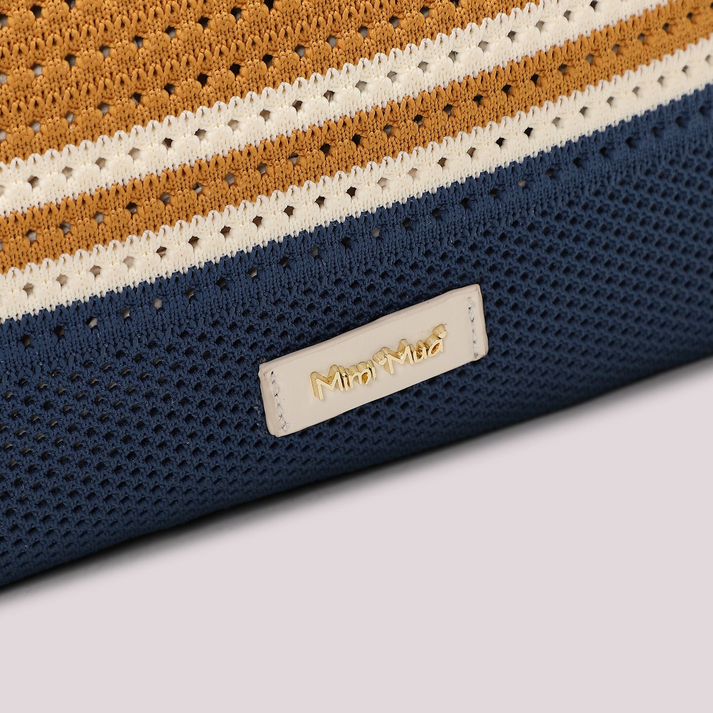 BORSA A BUSTA IN MAGLIA A RIGHE