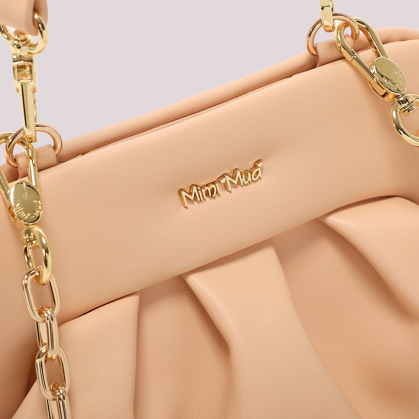 BORSA A CLUTCH BOMBATA