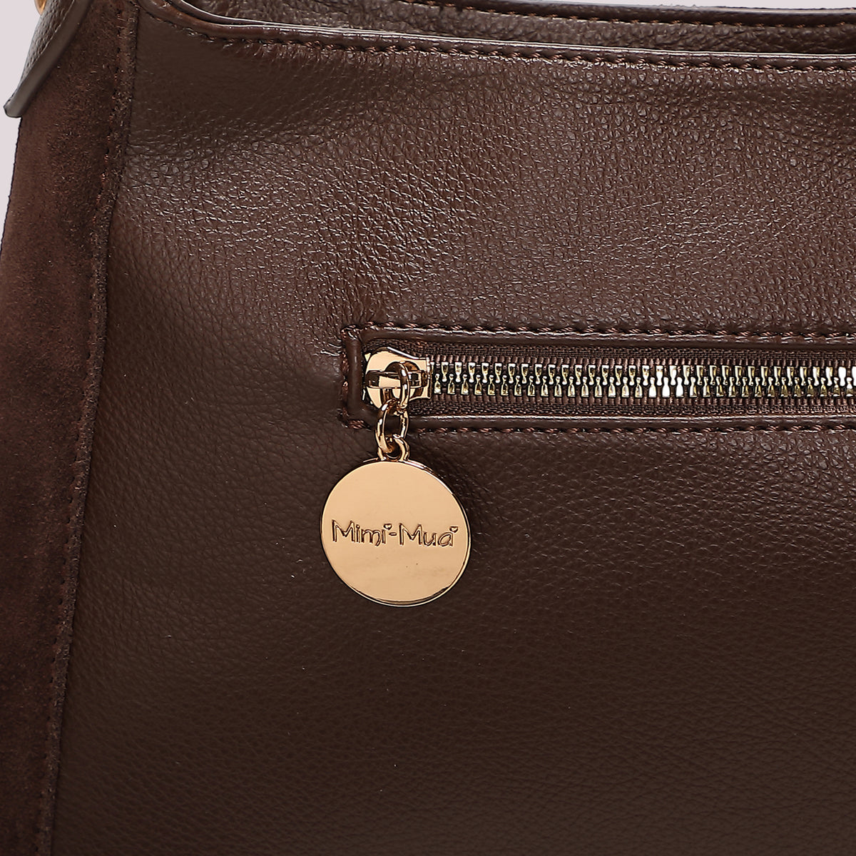 BORSA A TRACOLLA CON FRANGE E BORCHIE