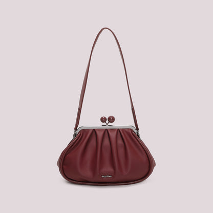BORSA CLUTCH MORBIDA CON CHIUSURA A SFERE