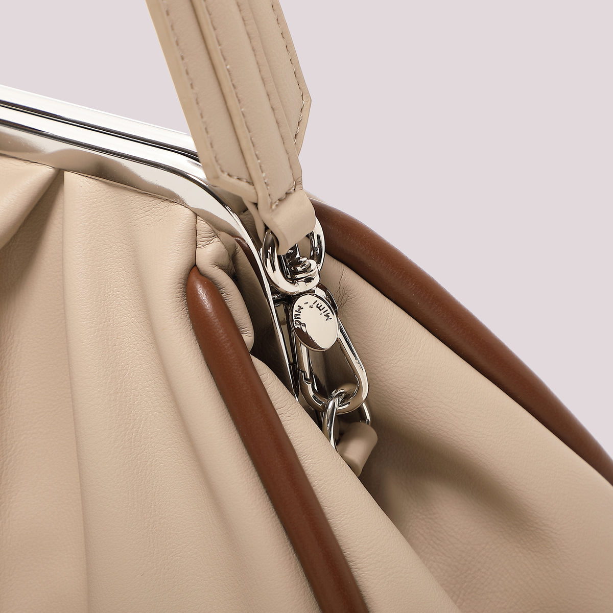 BORSA CLUTCH MORBIDA CON CHIUSURA A SFERE