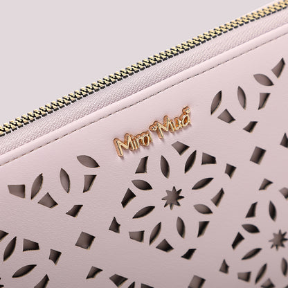 PORTAFOGLIO GRANDE CON MOTIVO TRAFORATO