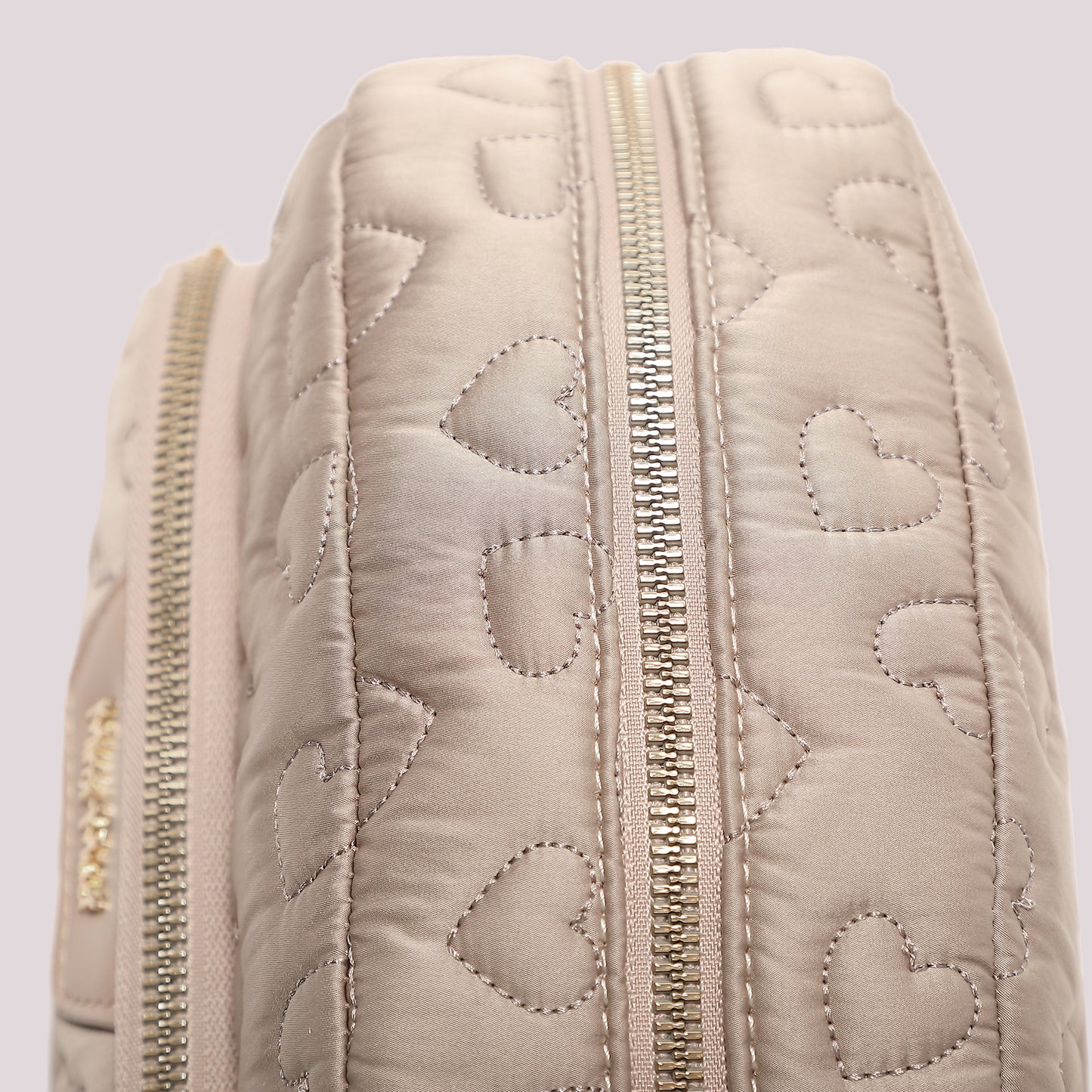 BEAUTY CASE TRAPUNTATA A CUORI