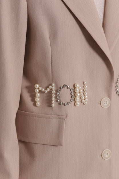 GIACCA CON DETTAGLIO SCRITTA FRONTALE