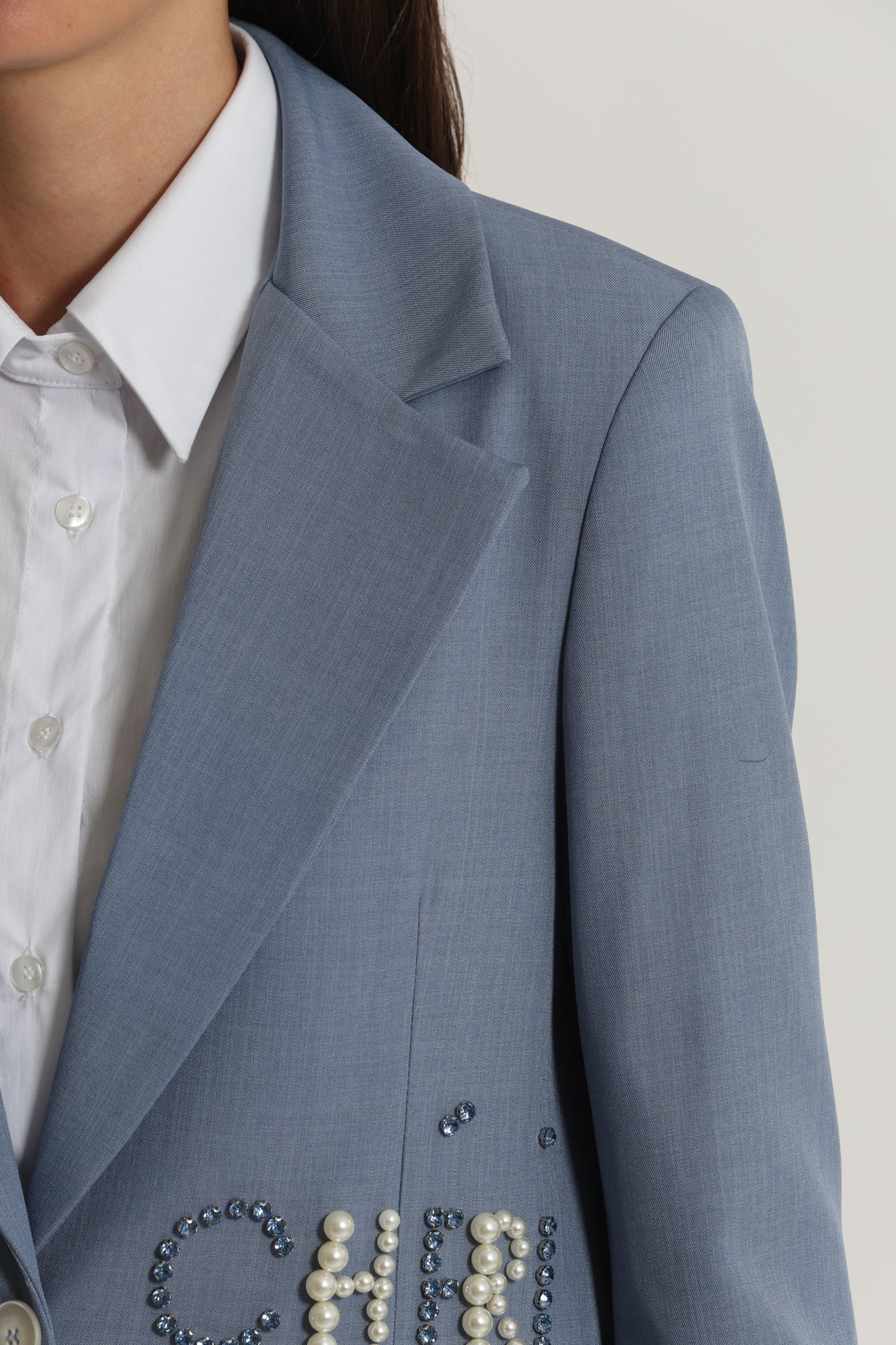 GIACCA CON DETTAGLIO SCRITTA FRONTALE