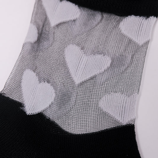 CALZINI D NERO CUORI BIANCO