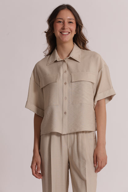 CAMICIA CROPPED CON DETTAGLIO BORCHIE