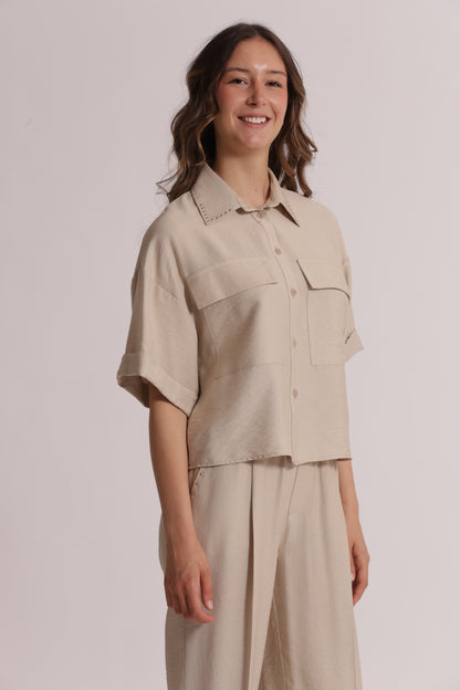 CAMICIA CROPPED CON DETTAGLIO BORCHIE