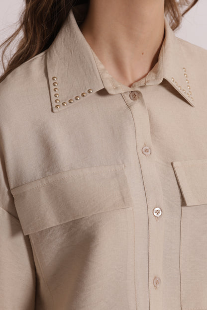 CAMICIA CROPPED CON DETTAGLIO BORCHIE