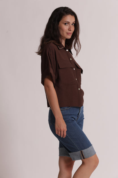 CAMICIA CROPPED CON DETTAGLIO BORCHIE