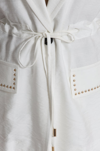 GIACCA CON DETTAGLIO BORCHIE