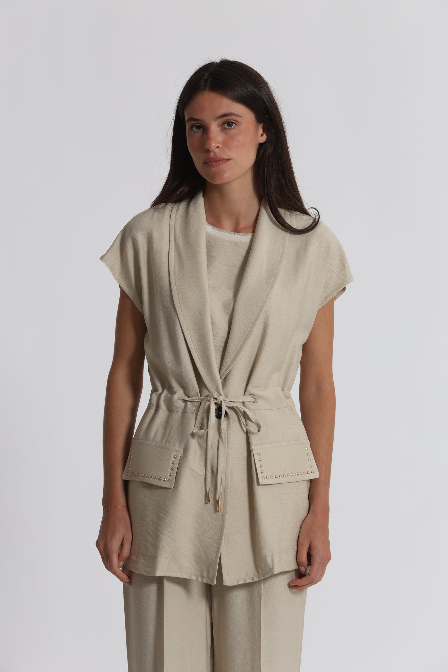 GIACCA CON DETTAGLIO BORCHIE