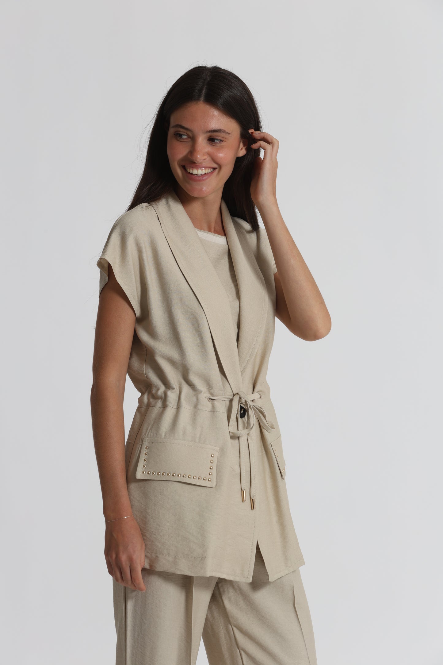 GIACCA CON DETTAGLIO BORCHIE