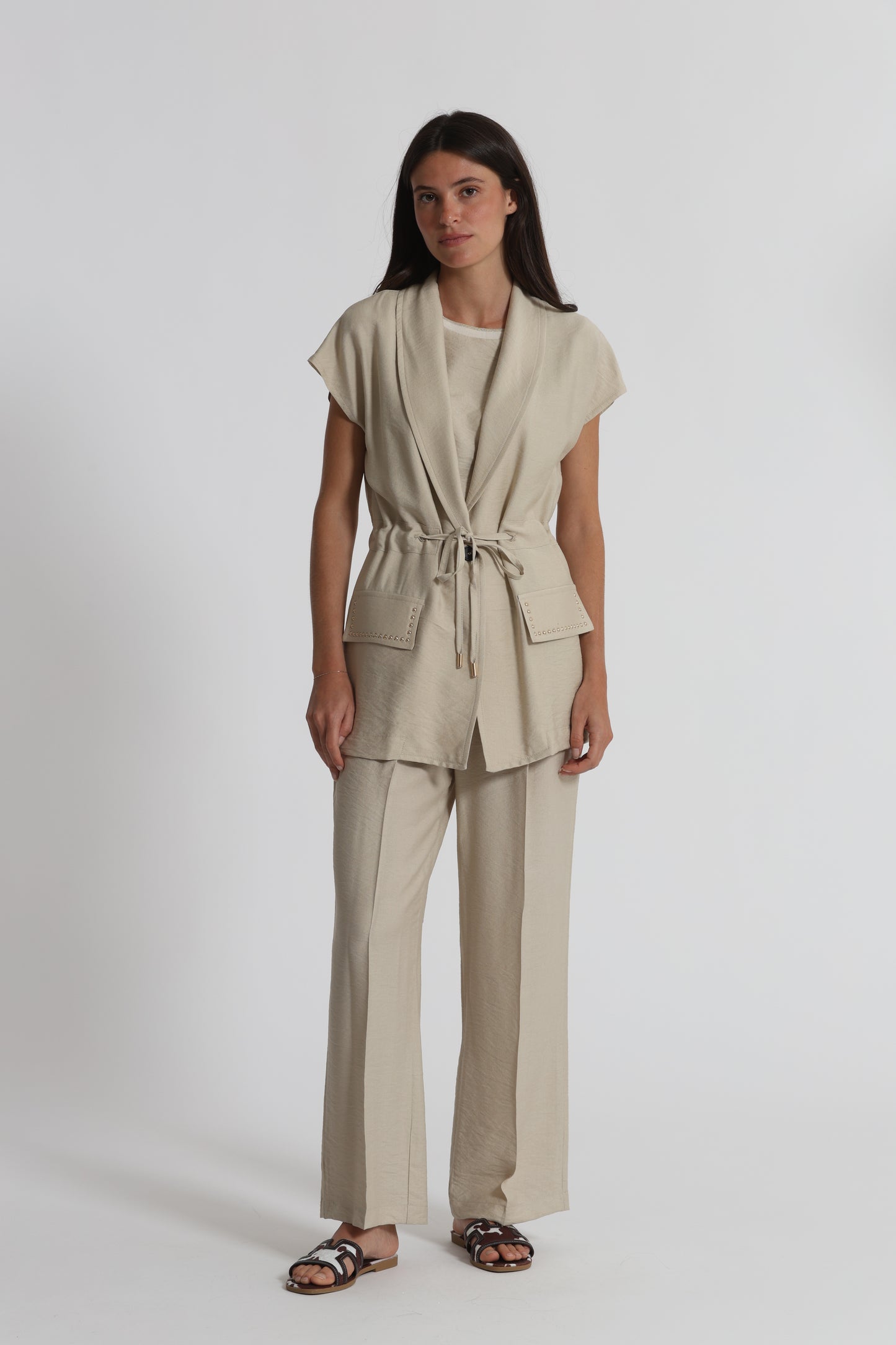 GIACCA CON DETTAGLIO BORCHIE