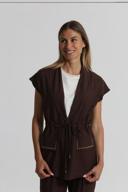 GIACCA CON DETTAGLIO BORCHIE